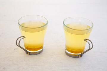 Two Glass Cups with fresh Yuzu tea