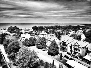 Sightseeing Frombork. Artistic look in black and white on beautiful Polish medieval city. Frombork, Poland.