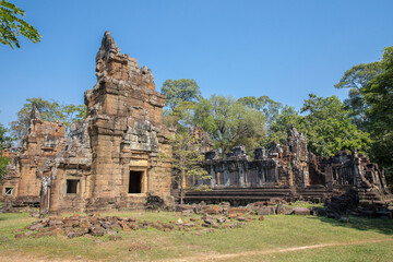 Ancient Preah Palilay temple in Angkor Thom and huge Banyan trees, Angkor, Cambodia.