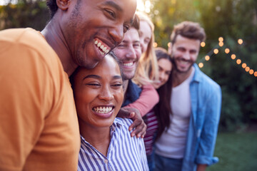 Fototapeta premium Group Of Multi-Cultural Friends Enjoying Outdoor Summer Garden Party