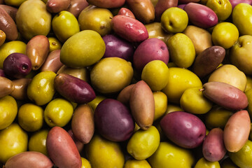 Tasty mix olives background.