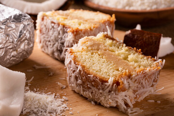 Traditional iced cake with coconut and milk sweet wrapped in aluminum foil.