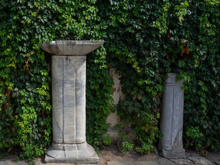 Fototapeta na wymiar stone columns in the garden
