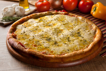 Traditional italian pizza on wooden.