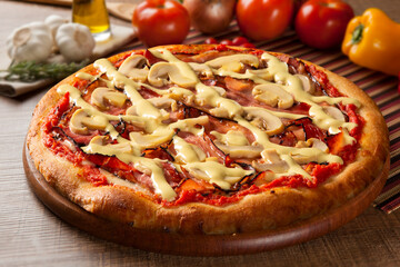 Traditional italian pizza on wooden.