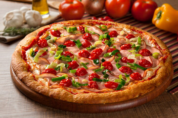 Traditional italian pizza on wooden.