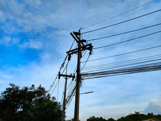 electric pole with blue sky background