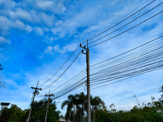 electric pole with blue sky background