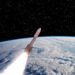 Rocket above the earth. Stars. Space concept. The elements of this image furnished by NASA.