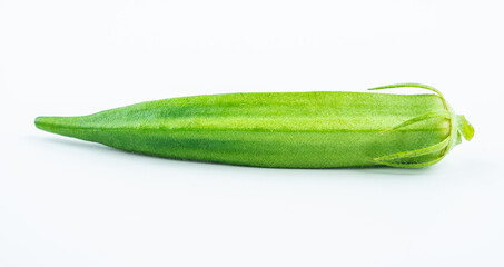 One fresh okra on white background