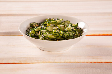 Sunomono - Japanese Cucumber Salad with sesame seeds.