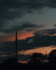 landscape of sunset with cloudy orange sky