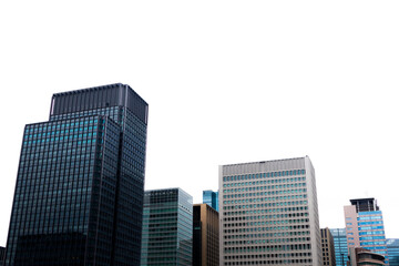 Fototapeta na wymiar Tokyo glass modern building against bright sky.