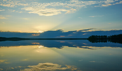 Fototapeta na wymiar Sunset over wild Lake Haikola