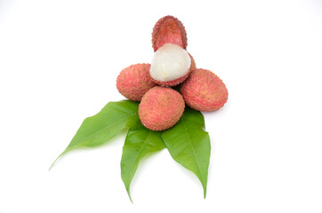 red ripe lychee with green leaves isolated on white background.