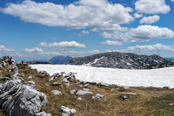 The last snow on the Krippenstein mountain in the Dachstein Mountains. Salzkammergut. Austria