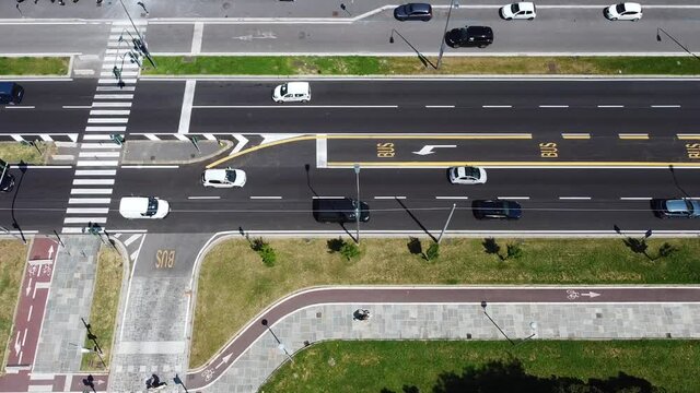 Europe, Italy , Milan - July 2020 - Drone aerial view of street with car from above - big traffic road to enter in downtown of the city in the Portello citylife district