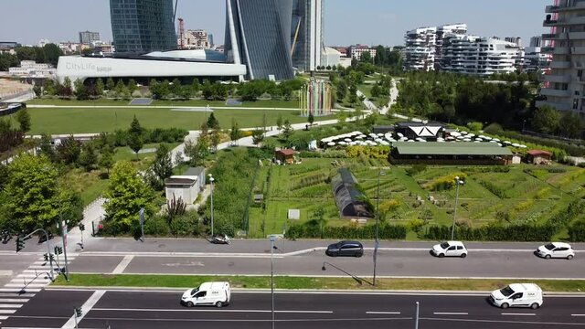 Italy , Milan July 2020 -  CityLife district with the Three Allianz (Il Dritto/The Straight One), Generali (Lo Storto/The Twisted One), PwC (Il Curvo/The Curved On - CityLife shopping area