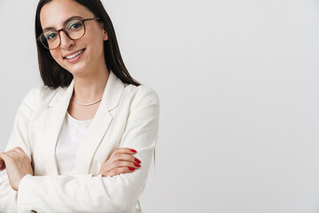 Photo of joyful businesswoman smiling and looking at camera