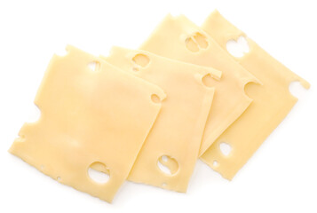 Pieces of cheese on a white background, isolated. The view from top