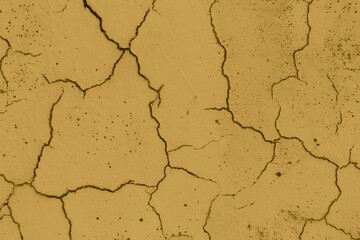 Yellow cracked wall. Abstract texture or background.