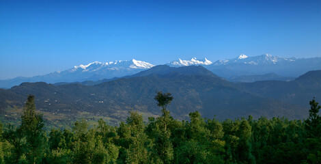 Fototapeta na wymiar Beautiful landscape of Himalayan snow mountains from Chaukori, Uttarakhand, India