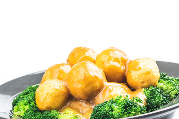 A plate of curry fish balls