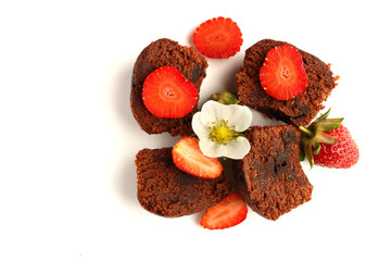 Tasty muffin cakes with strawberries and chocolate, isolated on white