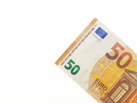 Paper money of the euro on a white background neatly laid out, straight, smooth. Denomination twenty, ten, fifty, five euros. Savings. Saving. Credit. Spare pillow for a rainy day.