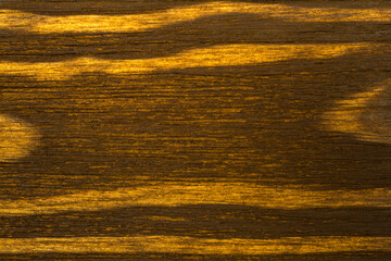 The texture of the brown panel of wood closeup.