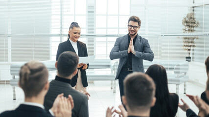 Naklejka na ściany i meble business team applauding at a work meeting