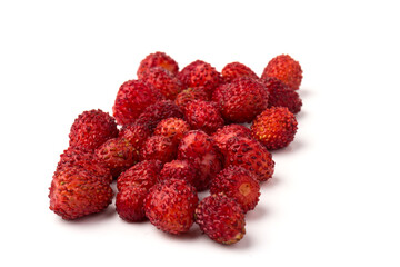 Macro view wild strawberry on white background. Forest red berries