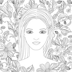 portrait of beautiful young woman with long hair against floral