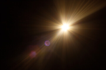 Easy to add lens flare effects for overlay designs or screen blending mode to make high-quality images. Abstract sun burst, digital flare, iridescent glare over black background.