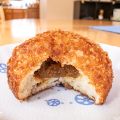 A delicious fried curry bun on a plate
