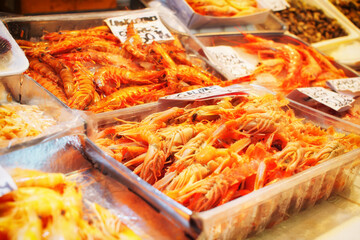 Pile of shrimps on fish market, toned