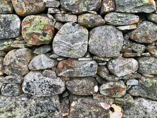 Ancient wall made of rocks in Scotland 
