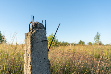 broken concrete power line pole