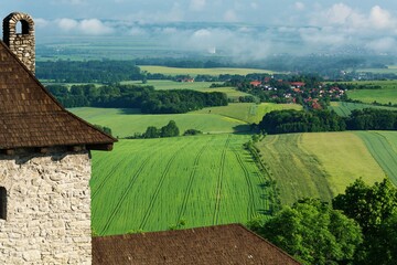 View of the fog in the valley from the castle ruins. In the morning. Stary Jicin. Moravia. Czechia. Europe.