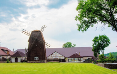 Panorama landscape windmills in village. Colorful spring landscape in Poland, Europe