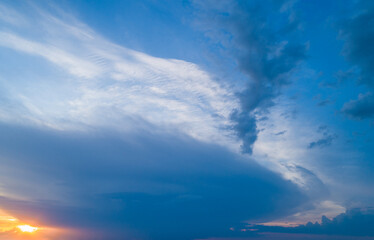 Naklejka premium Sunset sky with multicolor clouds