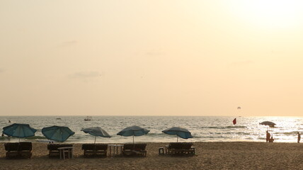 people walking on the beach of goa