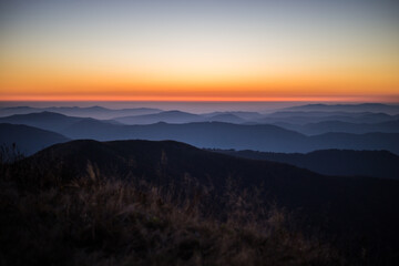 Fototapeta na wymiar Autumn in mountains panorama view sunny day pine sunrise