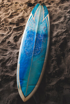 Surf board on the sand