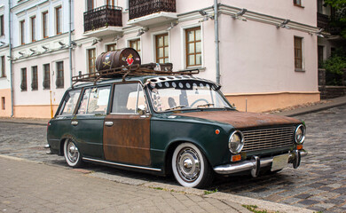 old rusty car on the street of Minsk