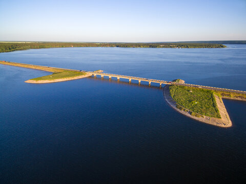 Aerial view to bridge on river at sunset, Severskiy Donets river