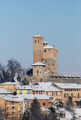 Fototapeta premium Castle of Serralunga d'Alba with snow, Piedmont - Italy