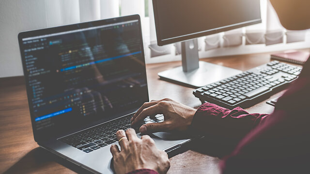 Programmer working in a software development and coding technologies. Website design. Technology concept.