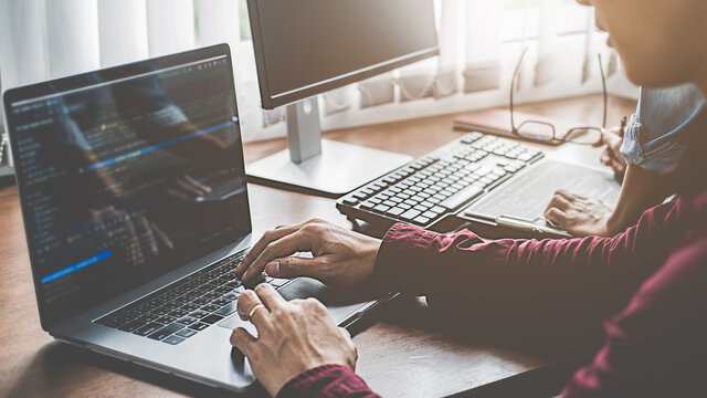 Programmer working in a software development and coding technologies. Website design. Technology concept.