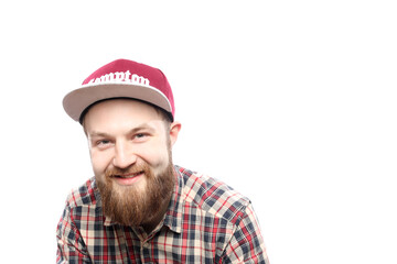 Happy caucasian bearded man in checkered shirt and in red cap isolated on white background